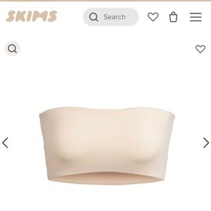 Fits everybody bandeau in the color sand. Size medium.